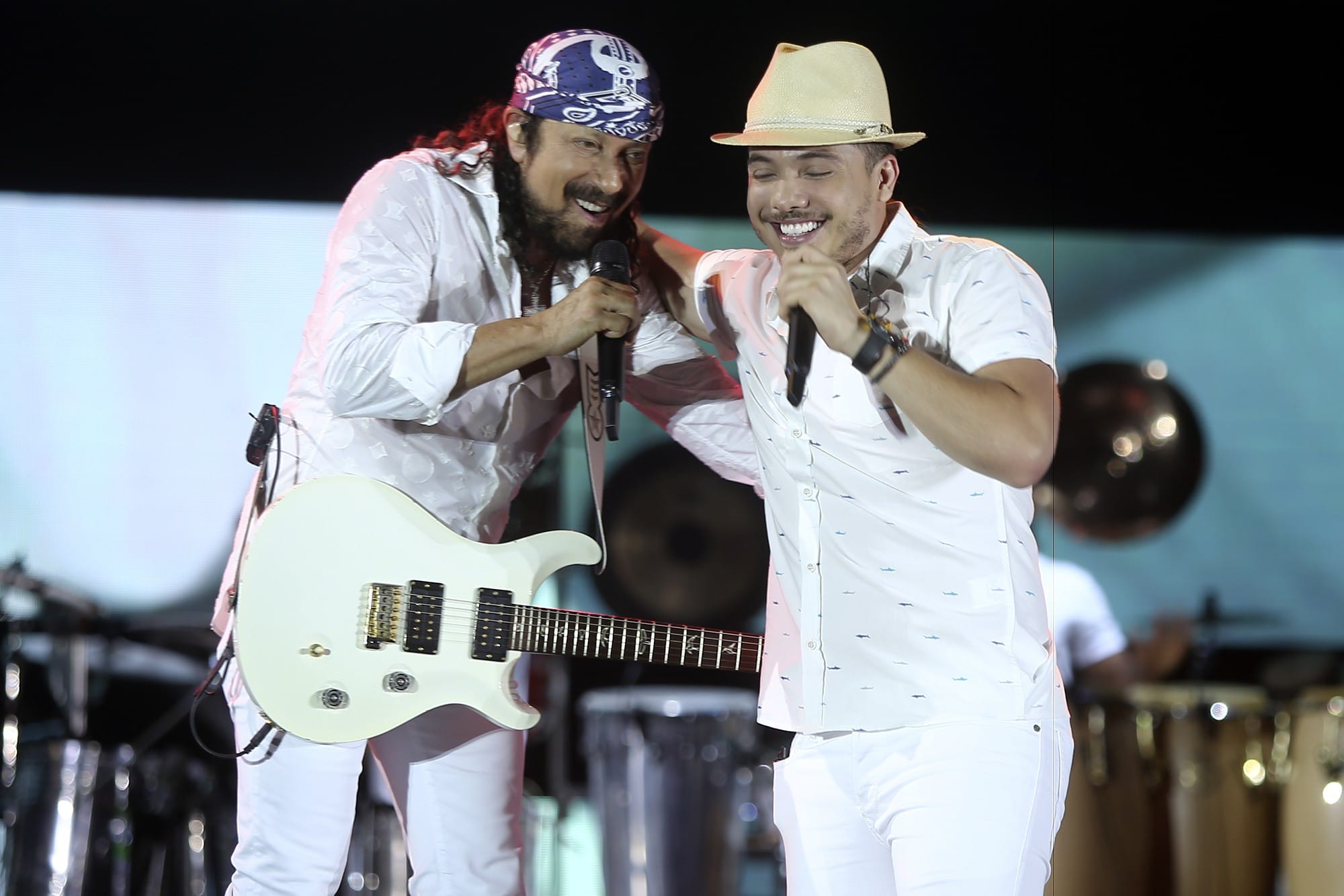 Na fotos os cantores Bell Marques e Wesley Safadão
